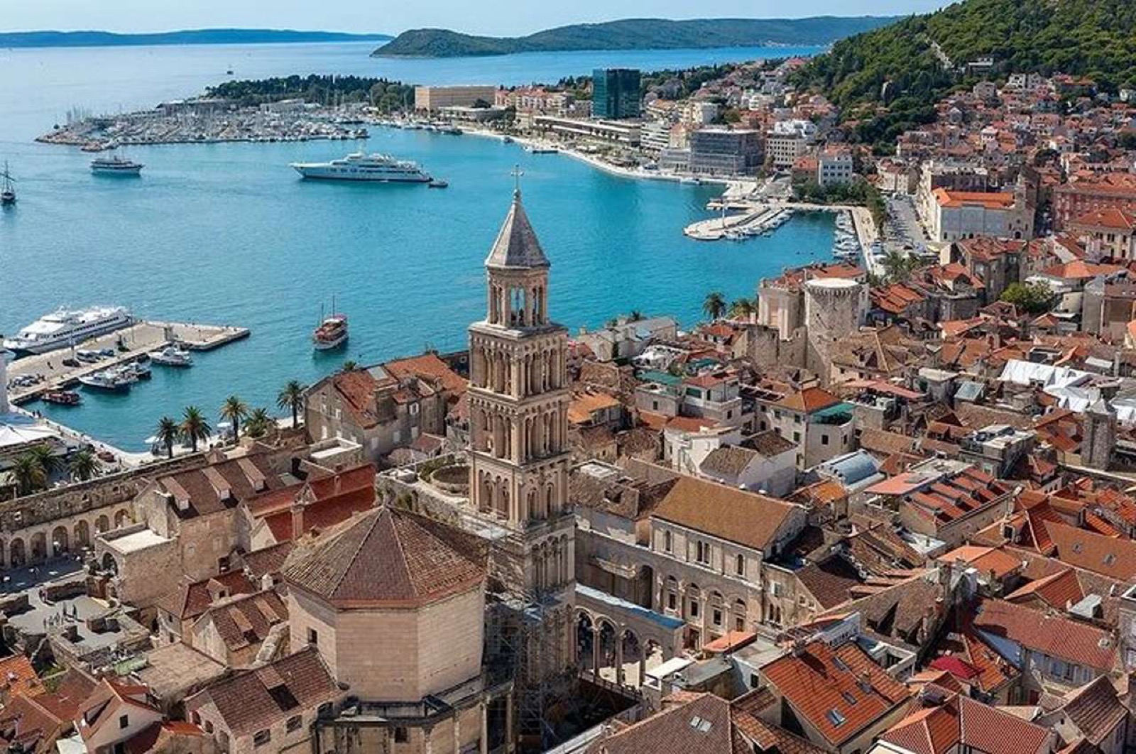 Cruise ship docked at Split harbor with the old town and bell tower in view