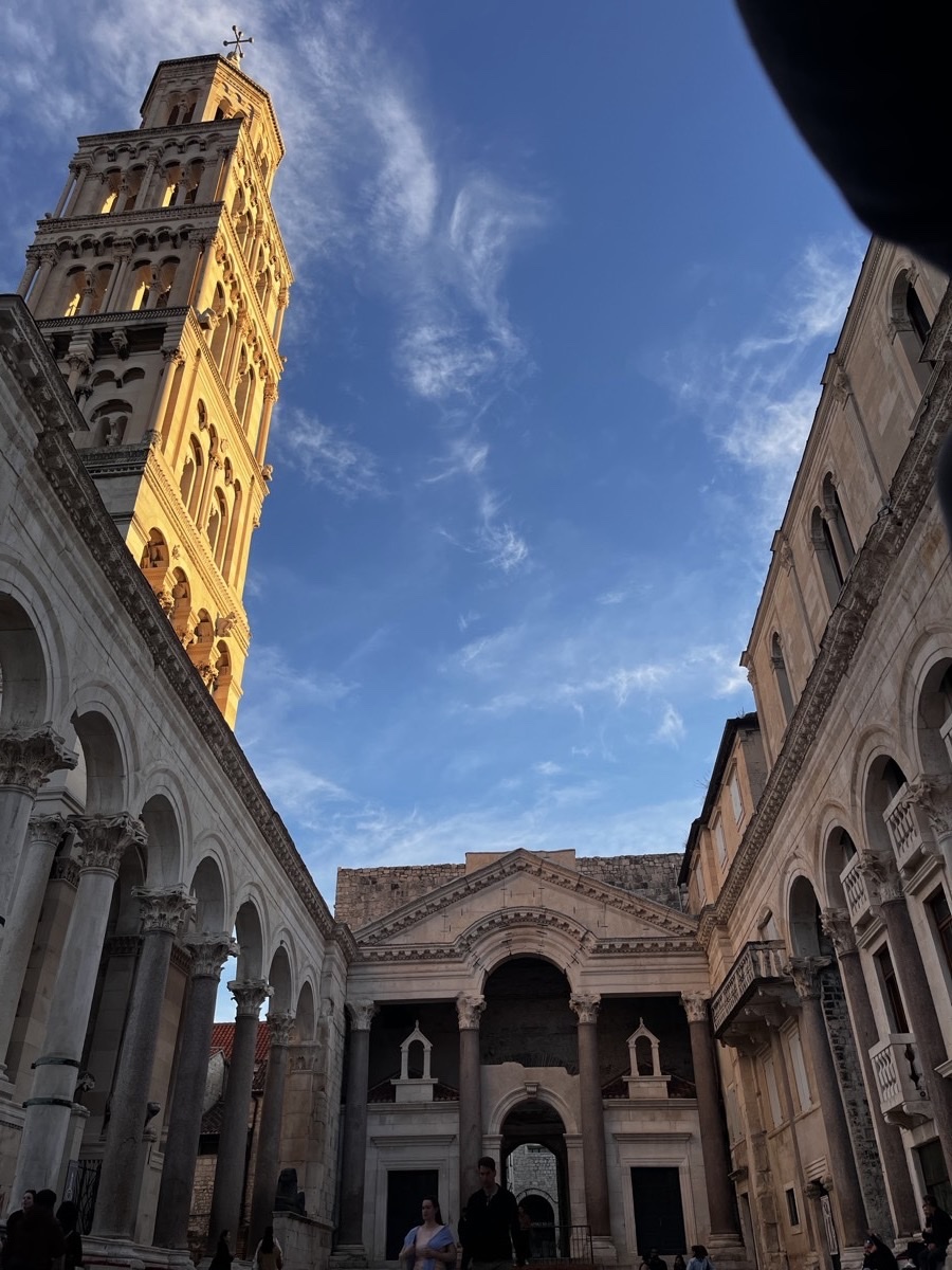 Polished limestone of Diocletian's Palace with the Split Cathedral bell tower above