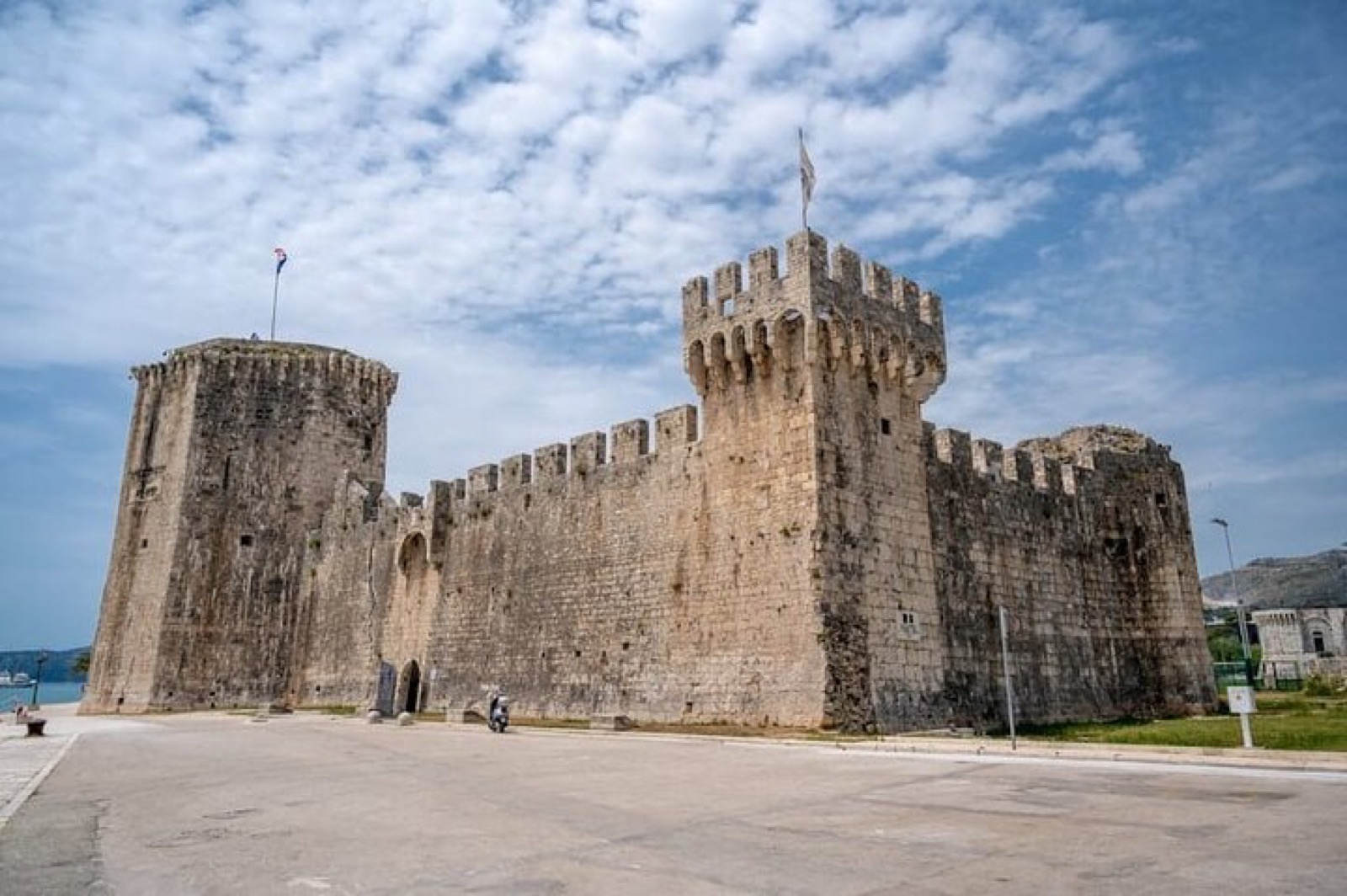 Kamerlengo Fortress on the Trogir waterfront against a blue Adriatic sky